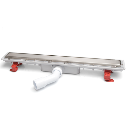 Canaleta Linnum con rejilla para plato de ducha de obra. Altura reducida. Sifón 30 mm. Ancho 50 mm. Salida orientable. Rejilla Soft. CERCO OCULTO